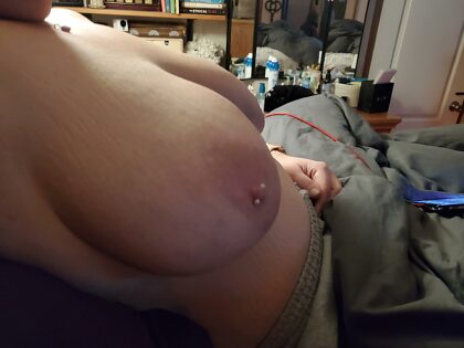 Here's a side view of my tits and messy room.
