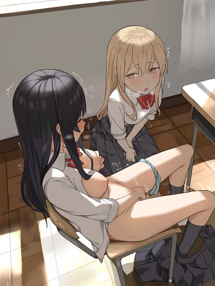 Schoolgirls having fun in class