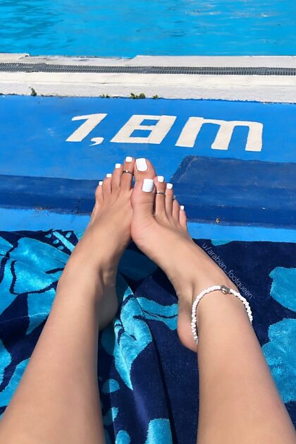 White toes at the pool, would you sneak a peek?