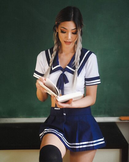 Schoolgirl with pigtails