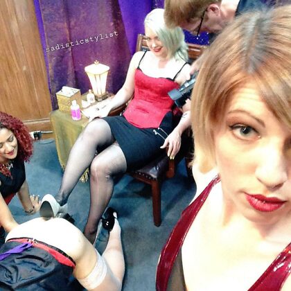 I'm the one in the chair, with My heel pressing a huge toy into our sissy's ass! I miss ganging up on a slut and really letting them have it!!