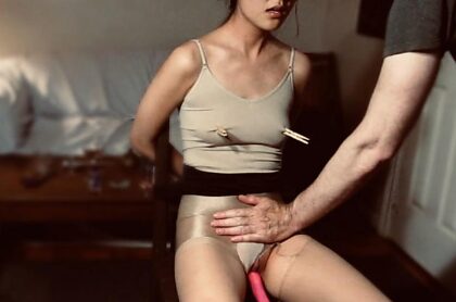 The vibrator is buried so deep into her hot little body I can feel the vibration though her belly. Such a good girl. Taking it.