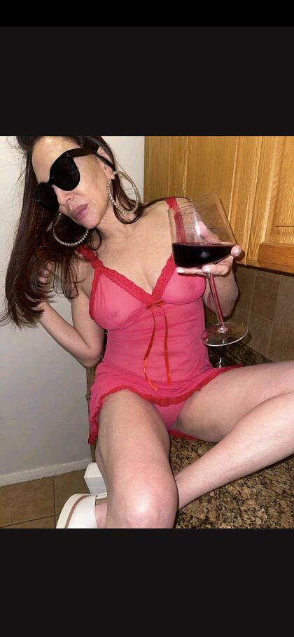 In my red see-through nighty. Want to join me for a glass of red?oc