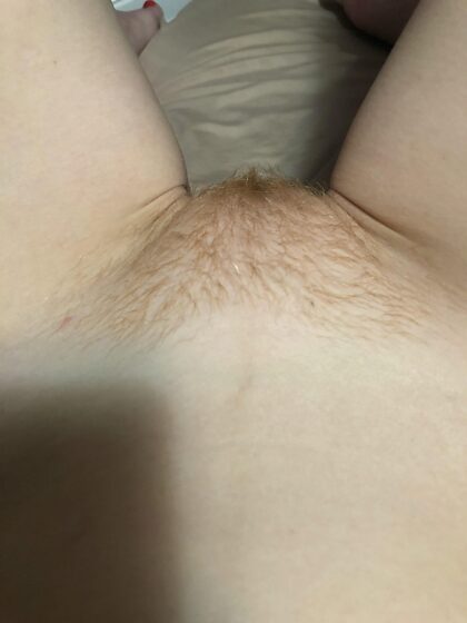 Do you like my little hairy pussy poking out between my legs?