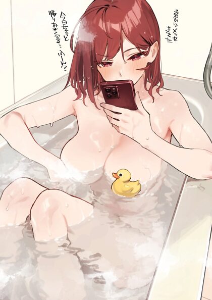 Controleert haar telefoon in de badkuip
