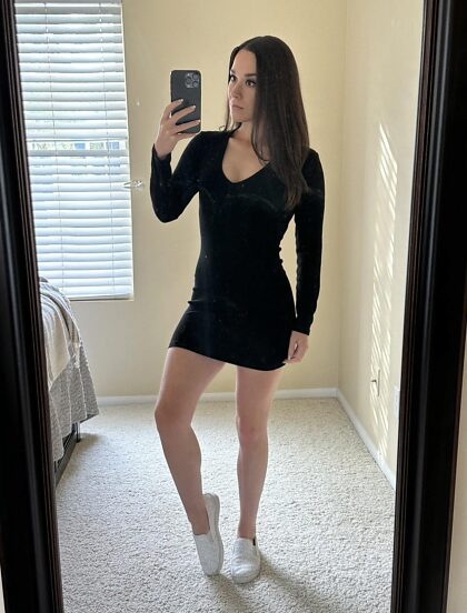 Showing off my legs in my mini dress.