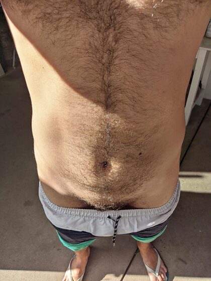 My pubic hair is starting to cover my dick, should I trim?