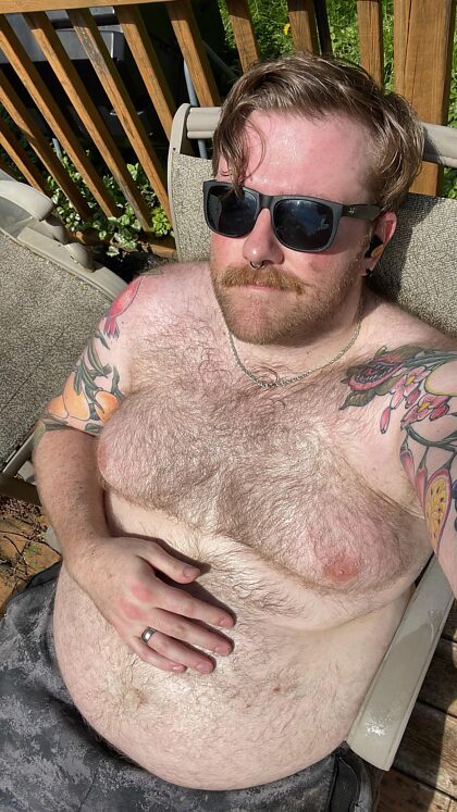 Post yard work sweaty bear recharging in the sun