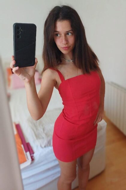 I wonder if I look good in this red dress 